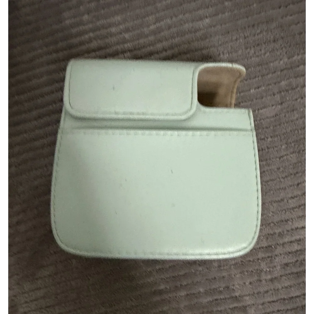 green camera case is designed for Fujifilm Instax Mini cameras